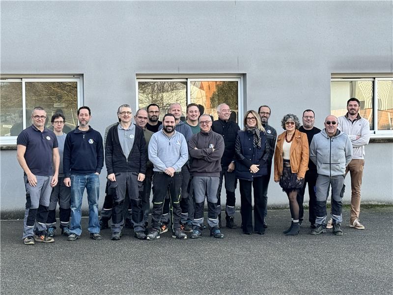 Photo de groupe de l'équipe de l'Arçonnerie Française